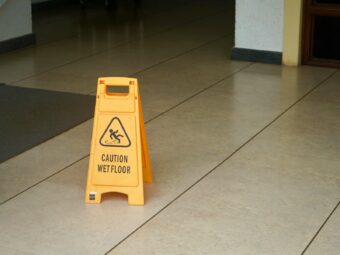 Photo by Praveen Thirumurugan yellow caution wet floor sign