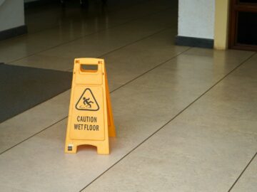 Photo by Praveen Thirumurugan yellow caution wet floor sign